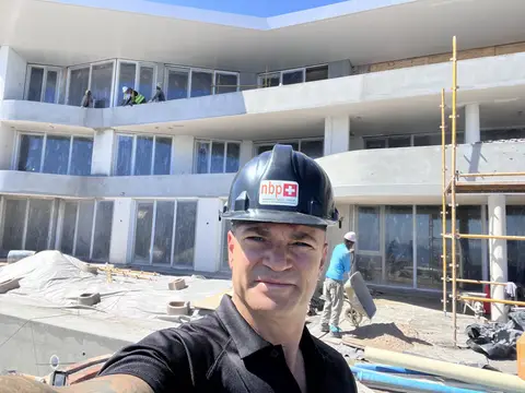 Jeremy on site with hard hat